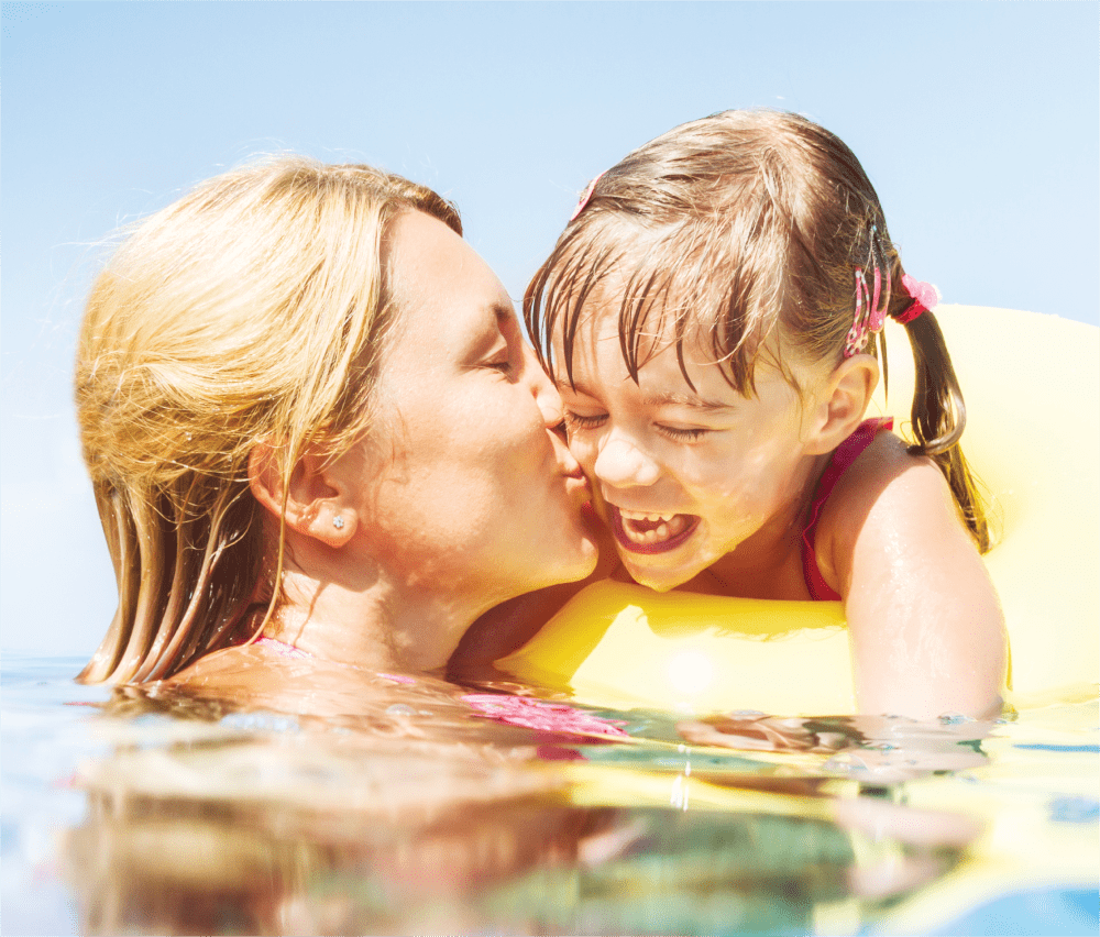 mom with daughter in pool